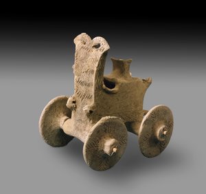 Modelo de carro prehistórico (arcilla cocida)